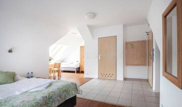 Фото номера Стандартный четырехместный номер Отель Holimo Hotel г. Строне-Слёнске 6