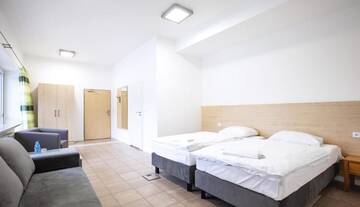 Фото номера Стандартный четырехместный номер Отель Holimo Hotel г. Строне-Слёнске 8