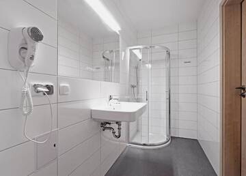 Фото номера Четырехместный номер Делюкс Отель Holimo Hotel г. Строне-Слёнске 5