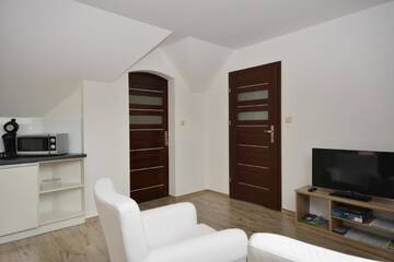Фото номера Апартаменты в пентхаусе Апартаменты Poduszka Apartamenty Zielony Dom г. Строне-Слёнске 8