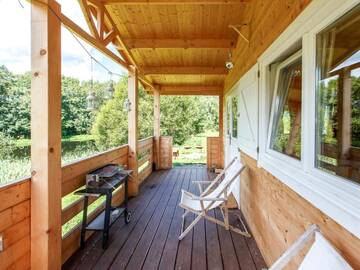 Фото номера Two-Bedroom Chalet with Terrace and Lake View Лоджи Osada Pstrąga г. Строне-Слёнске 7