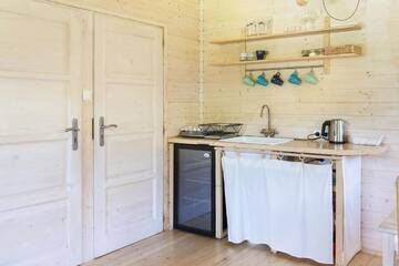 Фото номера Two-Bedroom Chalet with Terrace and Lake View Лоджи Osada Pstrąga г. Строне-Слёнске 11