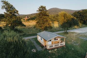 Фото номера Two-Bedroom Chalet with Terrace and Lake View Лоджи Osada Pstrąga г. Строне-Слёнске 13