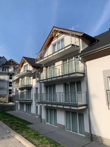 Фото номера Четырехместный номер с балконом Апарт-отели Czarna Góra Haven г. Строне-Слёнске 35