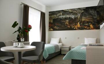 Фото номера Стандартный семейный номер Отель Hotel Stronie г. Строне-Слёнске 5